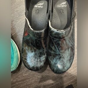 Dansko Black and Teal Patterned Clogs